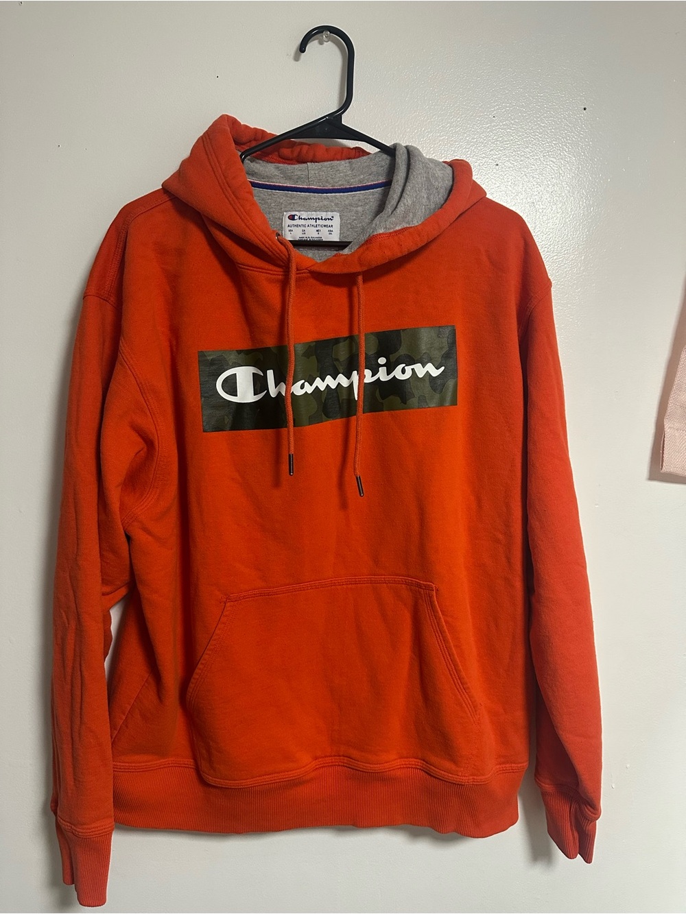 Champion Orange Hoodie with Camo Logo